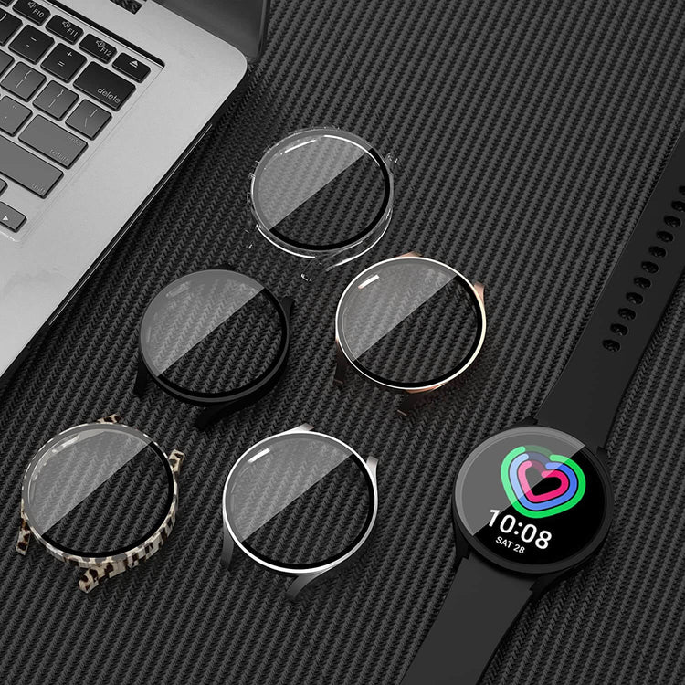 Samsung Galaxy Watch cases and screen protectors displayed alongside a laptop, featuring various styles and colors.