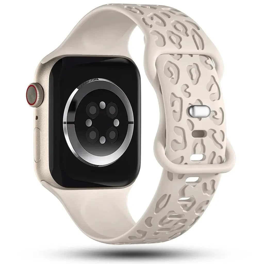 Engraved leopard's paws silicon band on Apple Watch, stylish and comfortable wrist accessory.