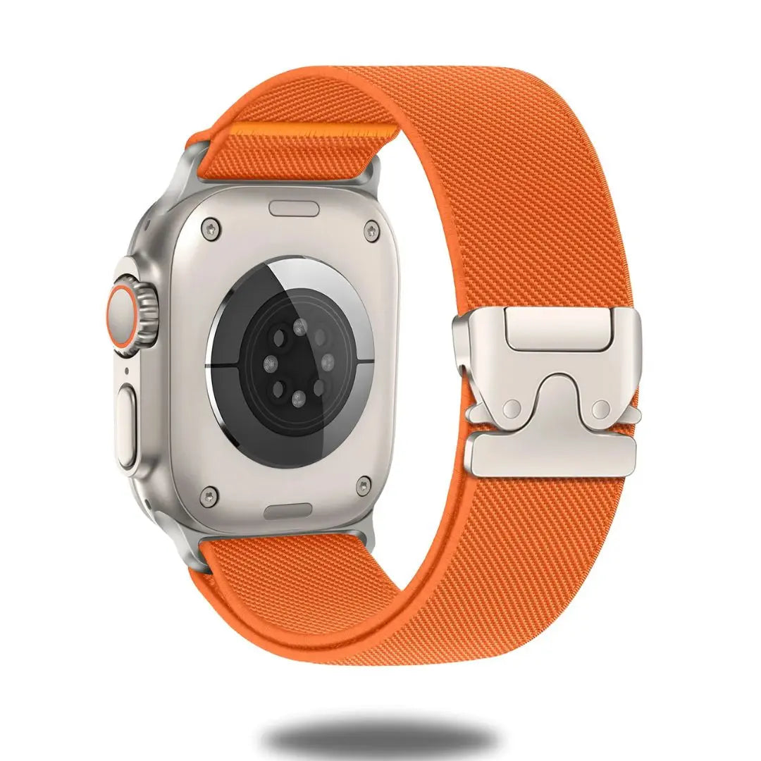 Apple Watch with Enzo stretchy solo loop band in vibrant orange, featuring a titanium parachute clasp for secure fit.