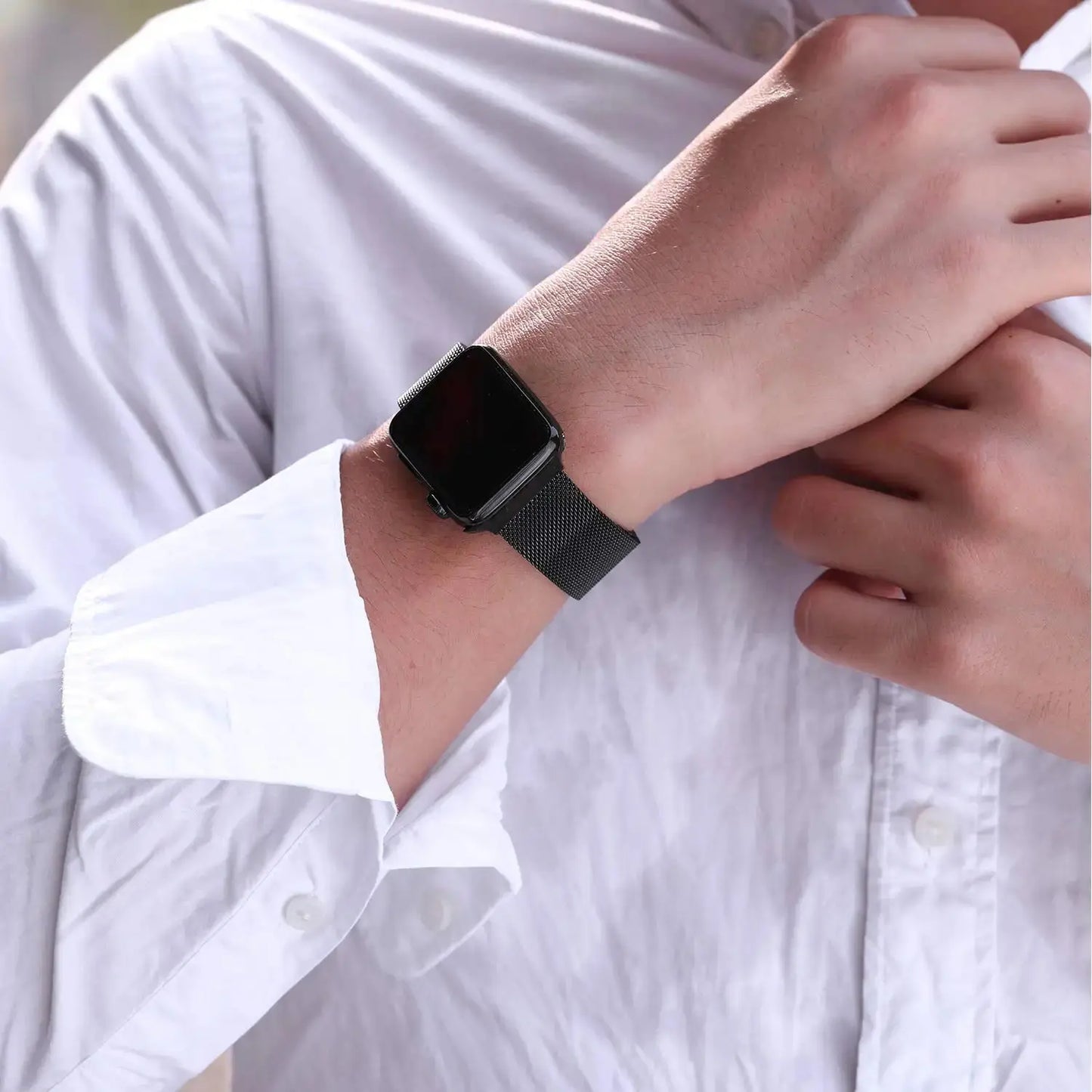 Stylish Milanese strap for Apple Watch with secure clasp worn on wrist, showcasing adjustable fit and premium design.