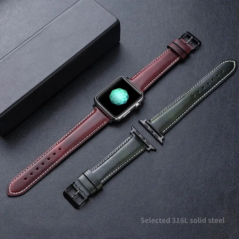 Oil waxed genuine leather Apple Watch band in red and green, showcasing classic pattern design and high-quality craftsmanship.