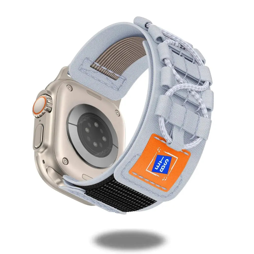 Rugged tactical nylon woven band for Apple Watch featuring a durable design and stylish woven texture in silver.