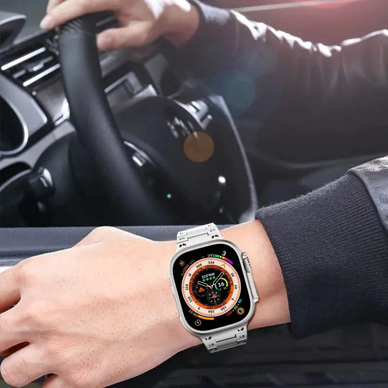 Stylish glossy titanium bracelet for Apple Watch worn while driving, showcasing elegance and strength.