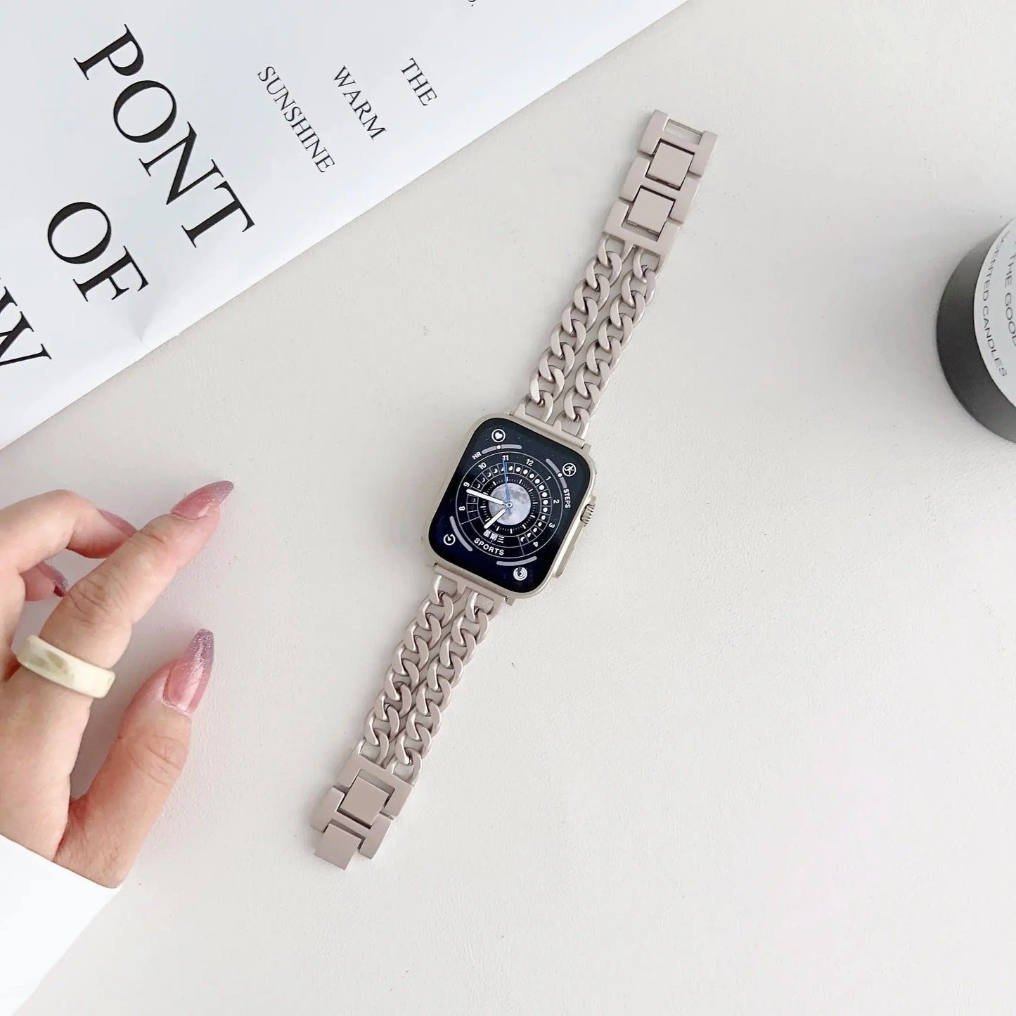 Luxurious starlight stainless steel bracelet for Apple Watch, showcasing elegant design and captivating shine.