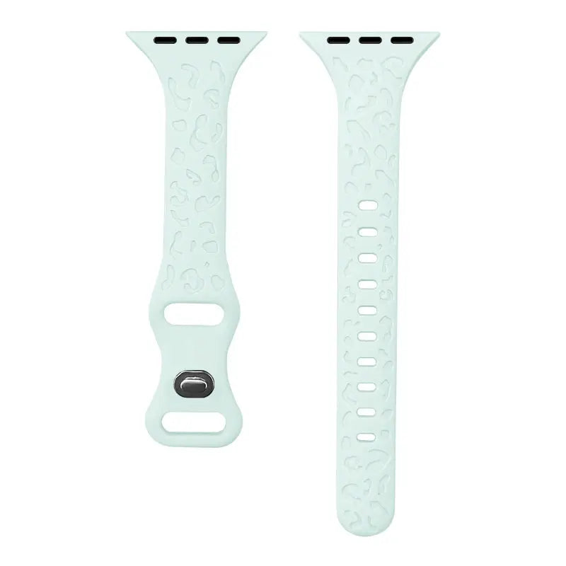 Engraved slim silicone Apple Watch band in mint green with leopard pattern design, combining style and individuality.