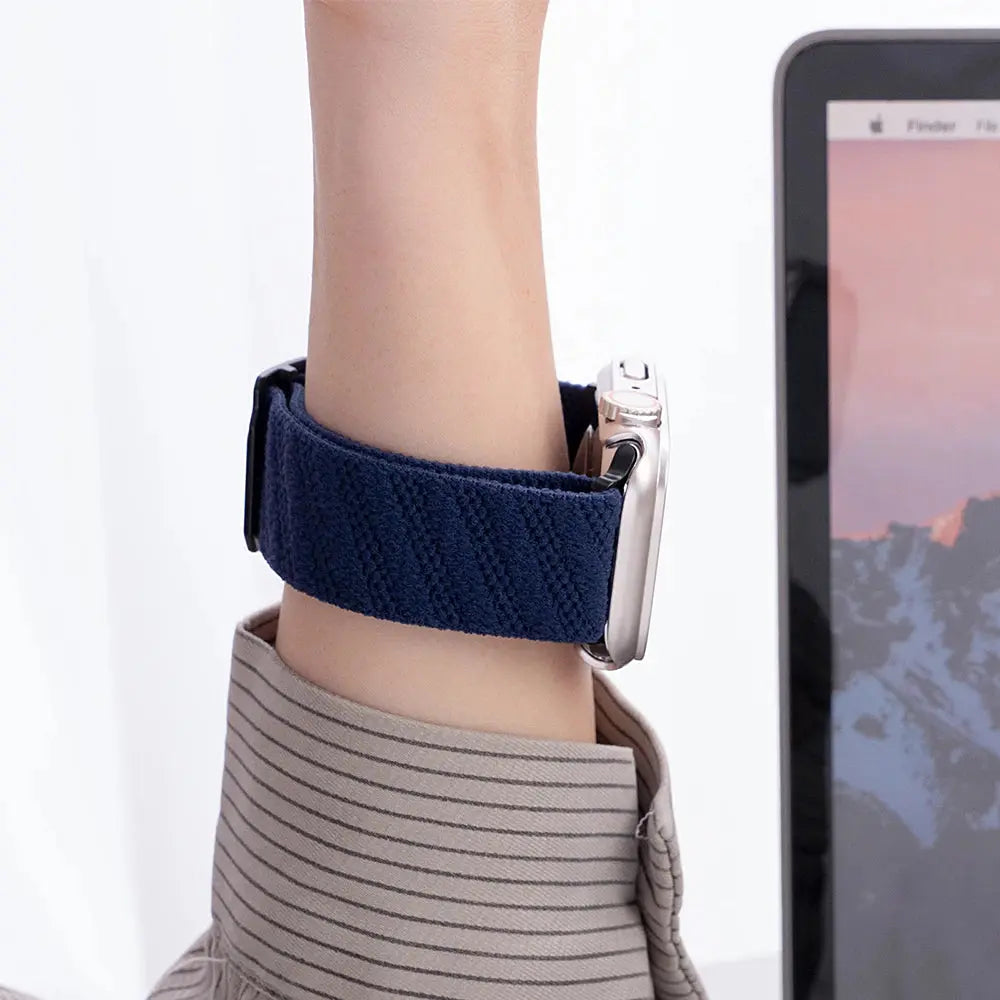 Comfortable blue Dennis stretchy elastic band on wrist with adjustable clasp, perfect for everyday style.