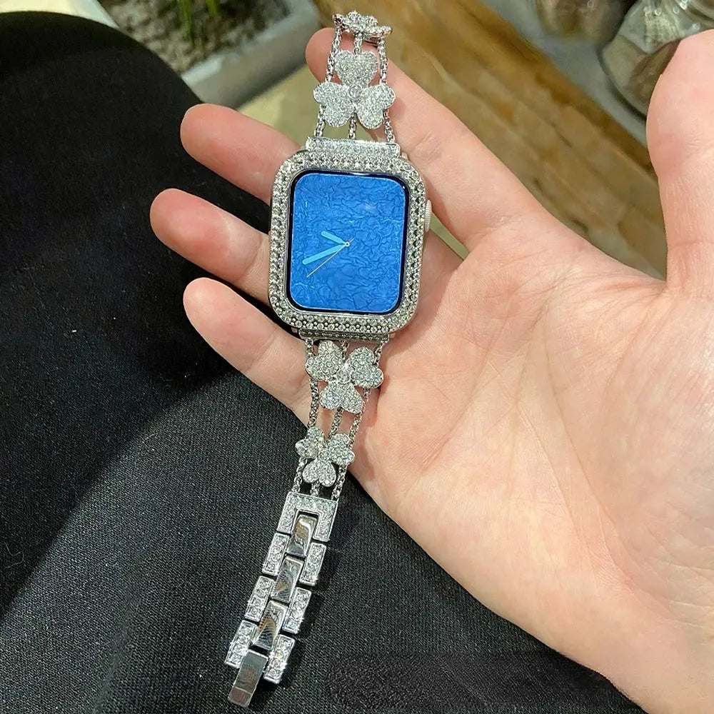 Gorgeous rhinestones bracelet with flower pattern and blue watch case, adding elegance to your wrist.