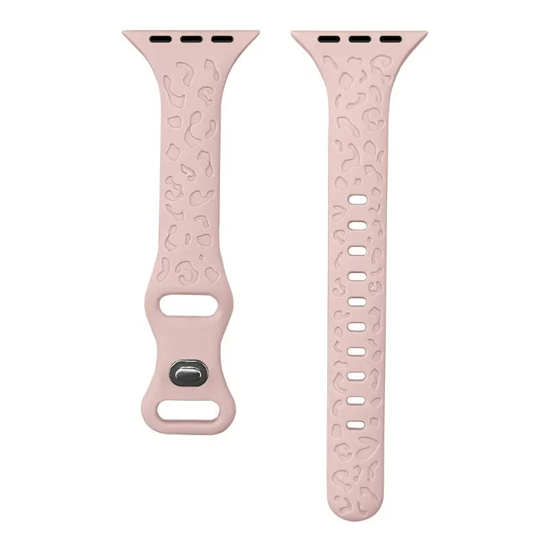 Engraved slim silicon Apple Watch band in soft pink with leopard pattern, perfect for style and individuality.