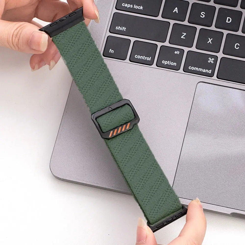 Dennis, The Stretchy Elastic Band showcasing green nylon material, adjustable clasp for custom wrist fit.