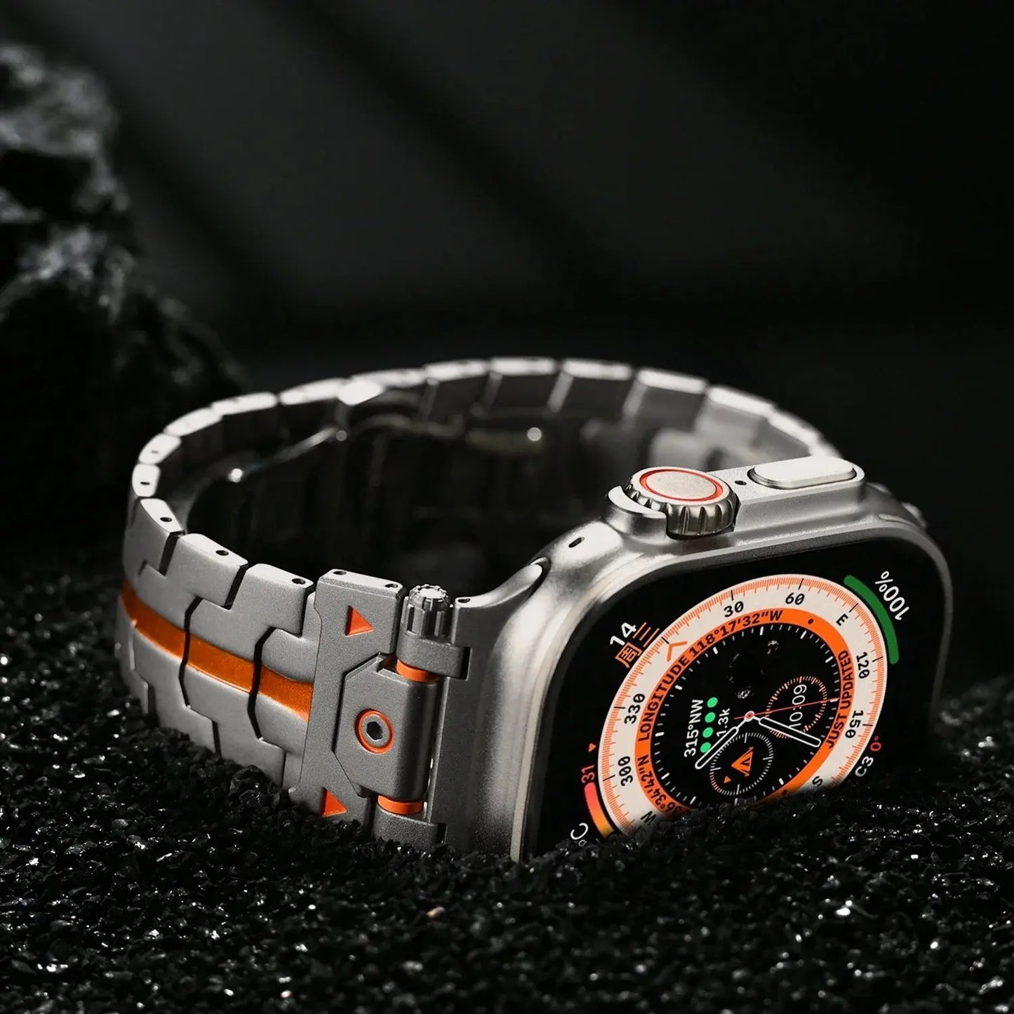 Close-up of Quentin Metal Band for Apple Watch Ultra, featuring sleek 316L stainless steel design and orange accents.