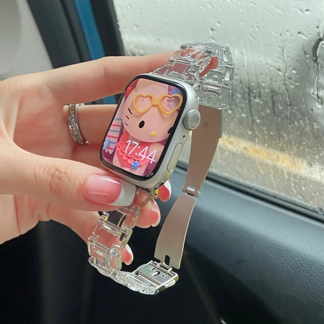 Clear Apple Watch Strap showcased on wrist in car, featuring transparent acrylic design and butterfly clasp for secure fit.