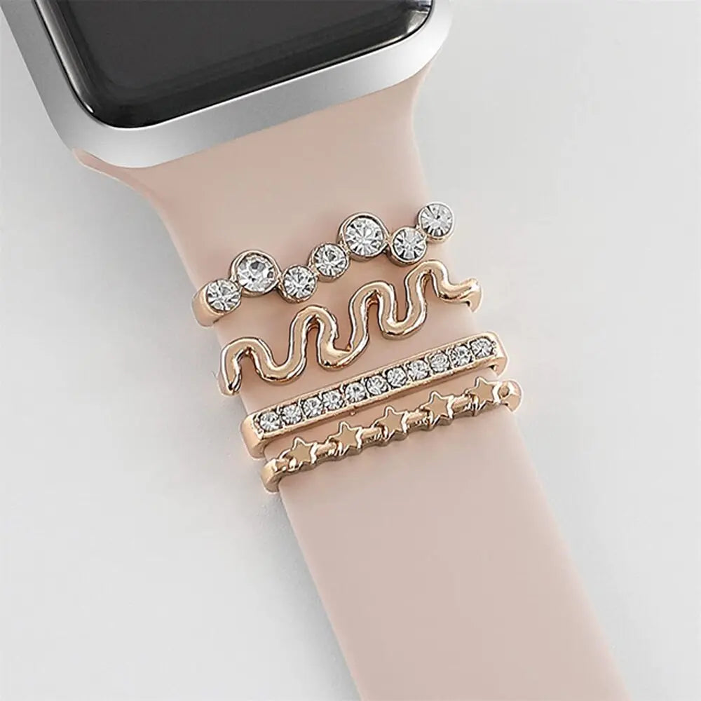 Decorative jewelry accessories for iWatch bands featuring sparkling crystal rings in gold and silver designs.