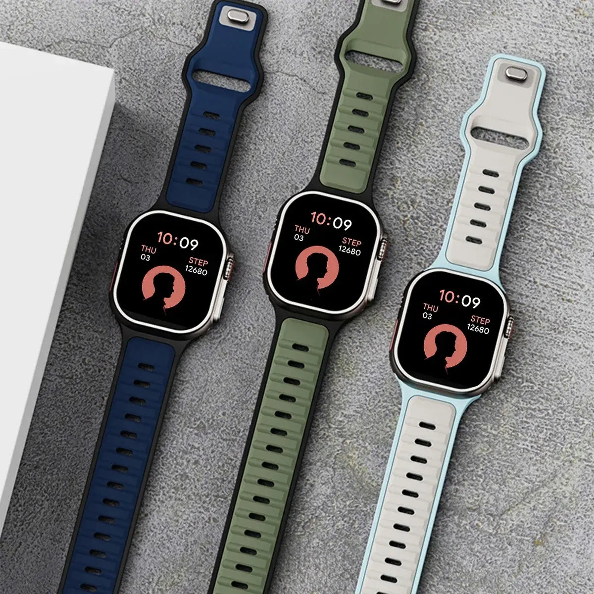 Trendy Rugged Silicon Dual Tone Sports Bands for Apple Watch in blue, green, and white, showcasing style and functionality.