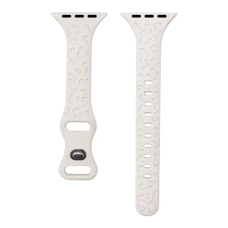 Engraved slim silicone Apple Watch band in white with leopard pattern, stylish and functional, perfect for individuality.