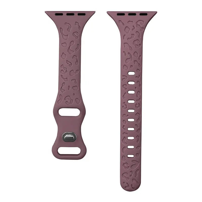 Engraved slim silicon leopard pattern Apple Watch band in burgundy, stylish and functional accessory.