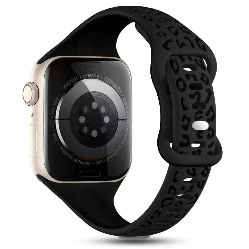 Engraved slim silicon band for Apple Watch in black leopard print pattern, showcasing unique style and functionality.