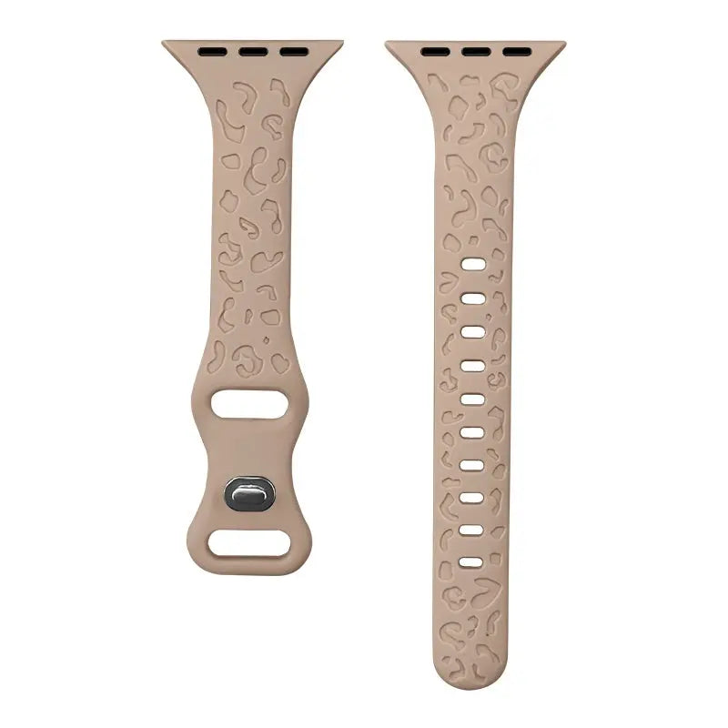 Slim silicone Apple Watch band with engraved leopard pattern in beige color, combining style and individuality.