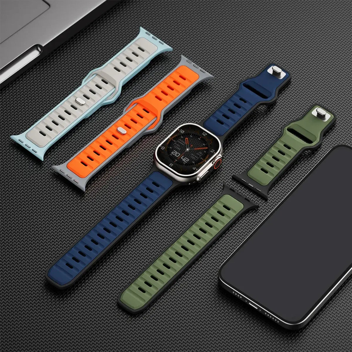 Trendy Rugged Silicon Dual Tone Sports Bands for Apple Watch in various colors, displayed alongside a smartphone.