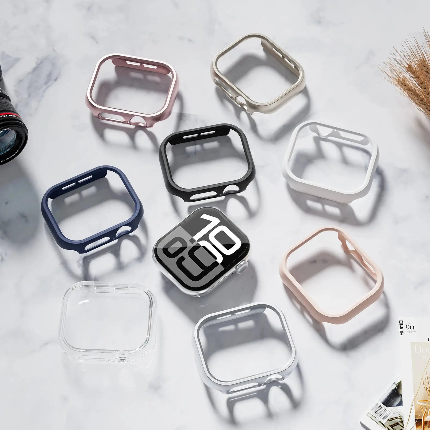 Colorful protective cases for Apple Watch Series 10 displayed on a marble surface, showcasing various styles and materials.