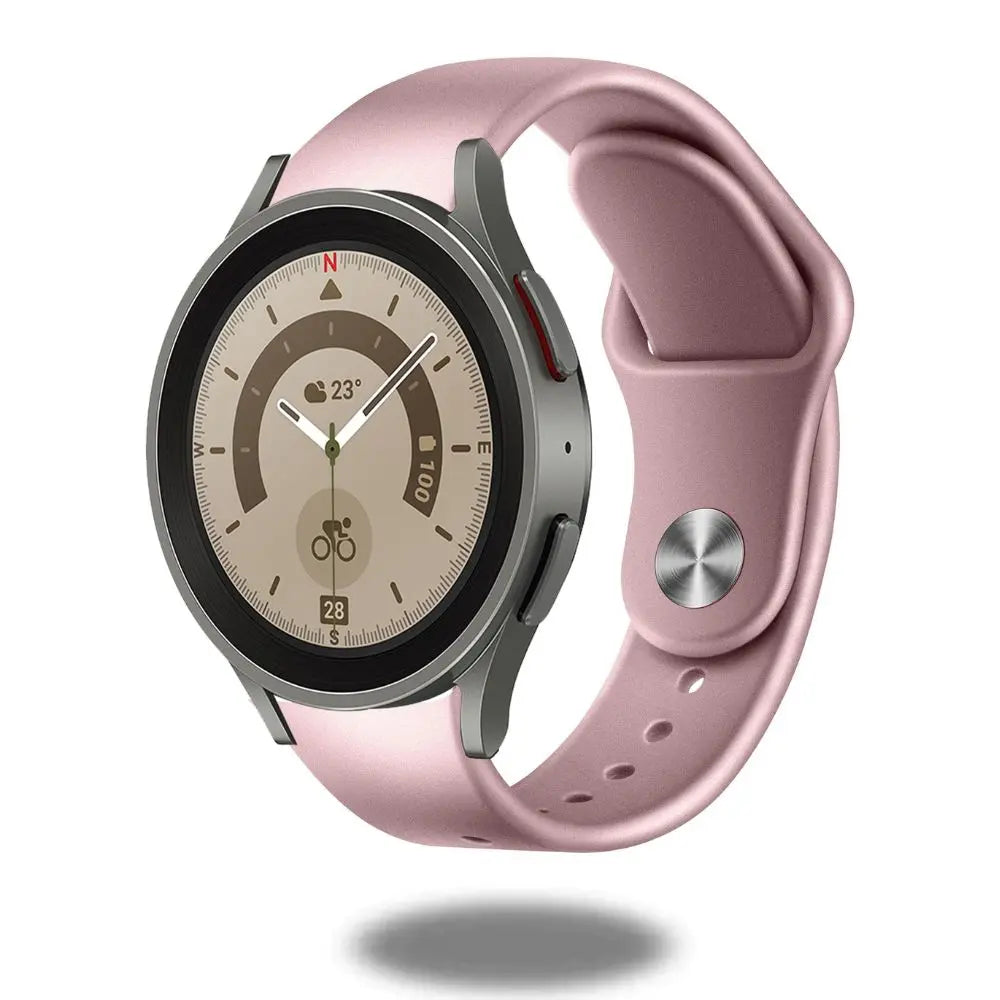Silicone smartwatch band in pink color, featuring sleek design and adjustable metal buckle for comfort and style.