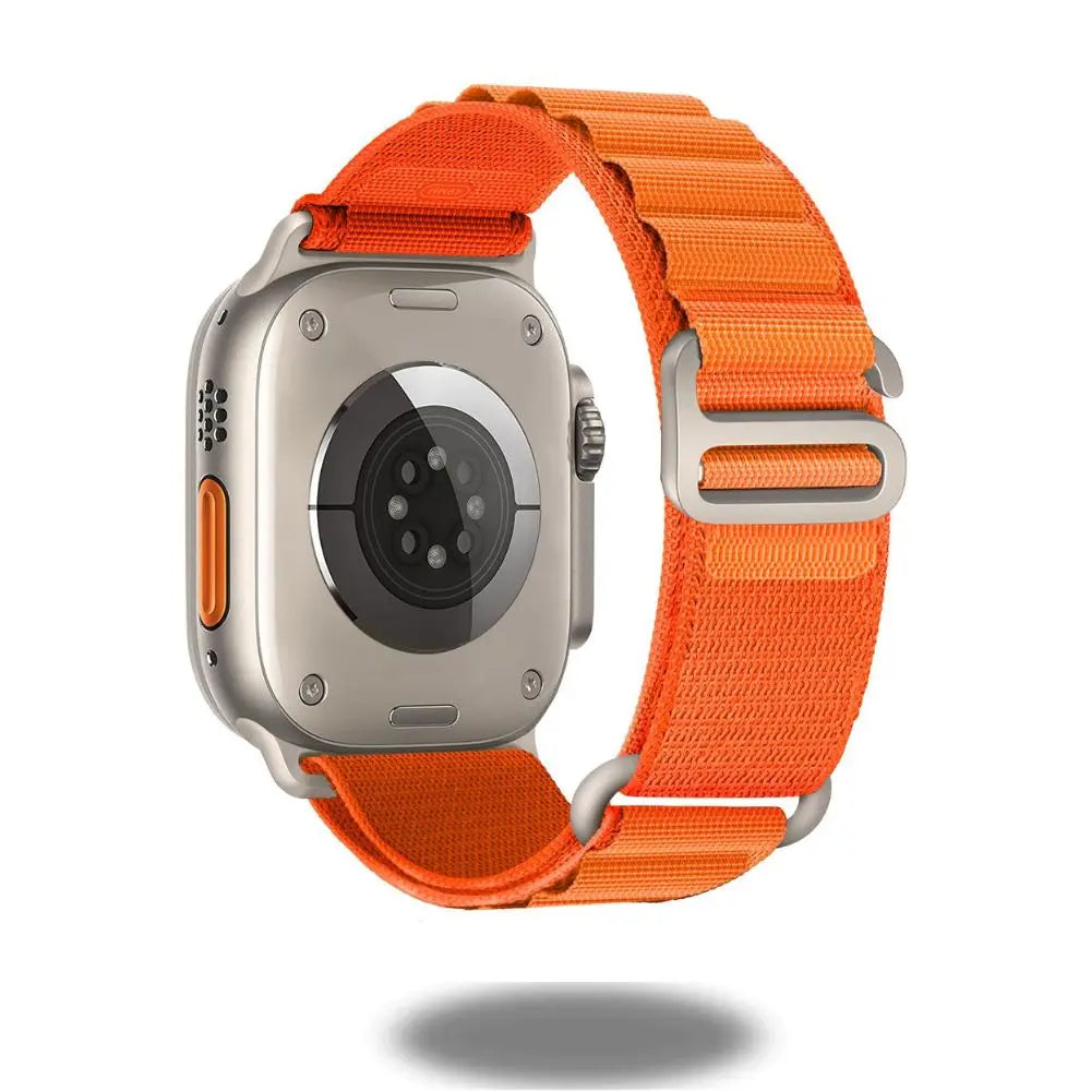 Rugged Upgraded Alpine Loop Apple Watch band in vibrant orange, showcasing durability and style for 2025.