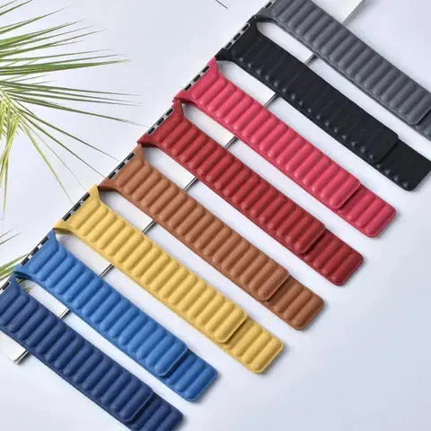 Assorted leather link bands for Apple Watch in various colors, featuring a two-tone design and comfortable fit.