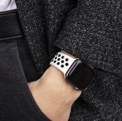 Trendy Sport Silicon Solo Loop Band displayed on wrist, perfect for Apple Watch, stylish and comfortable with breathable design.