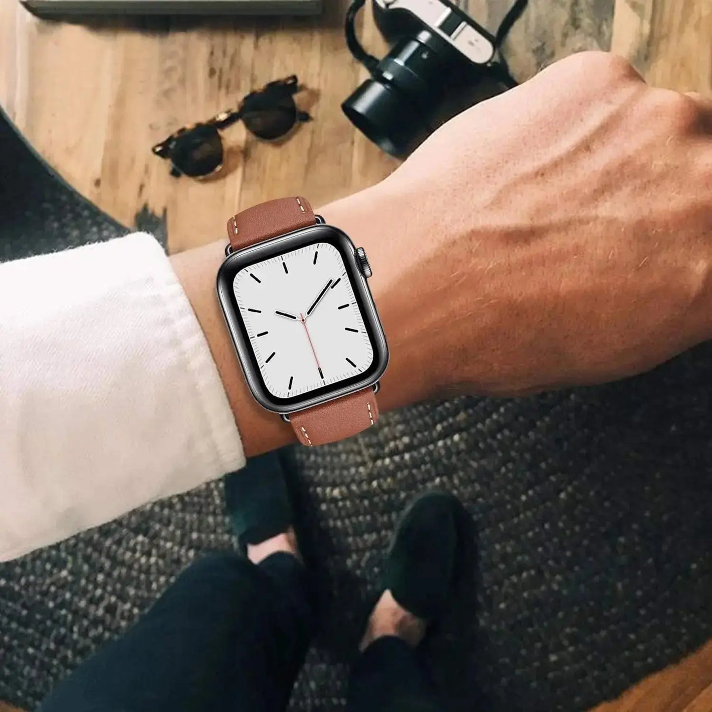 Classic single tour leather strap on Apple Watch, featuring vegetable-tanned leather and durable stainless steel adapters.