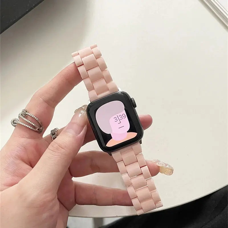 Clear Slim Acrylic Apple Watch Bracelet in hand, showcasing transparent design and modern style.