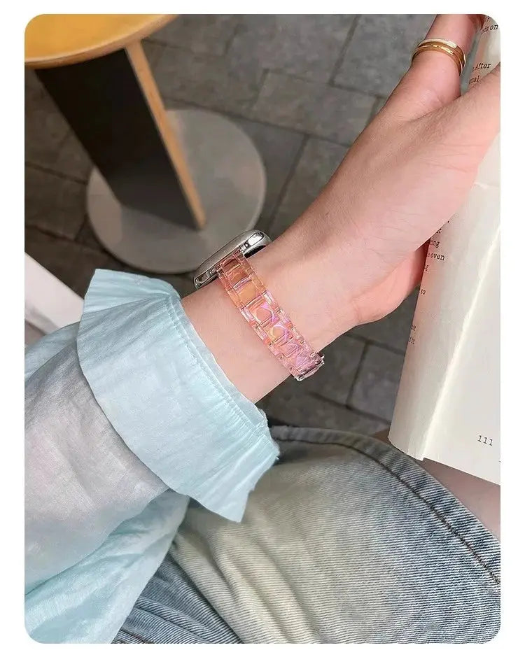 Clear Slim Acrylic Apple Watch Bracelet showcased on wrist, featuring a polished transparent design and stylish folding clasp.