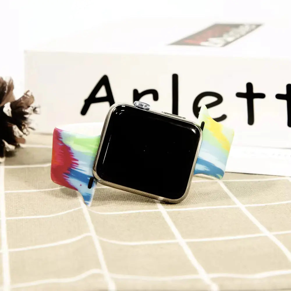 Colorful Pattern Silicon Solo Loop watch band showcasing vibrant design against neutral background.