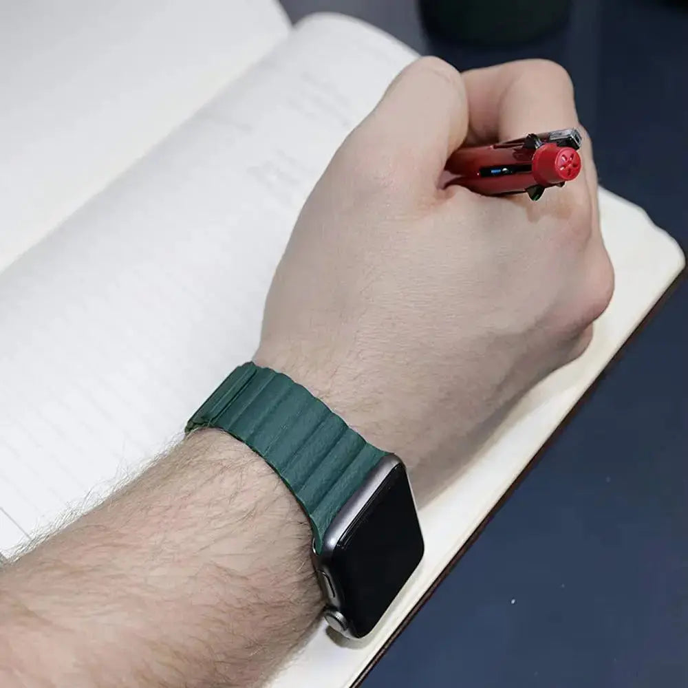 Adjustable leather loop Apple Watch band in green, featuring a two-way magnetic closure for a secure fit.