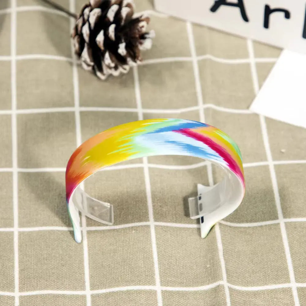 Colorful silicon solo loop watch band showcasing a vibrant rainbow design, perfect for adding flair to your style.