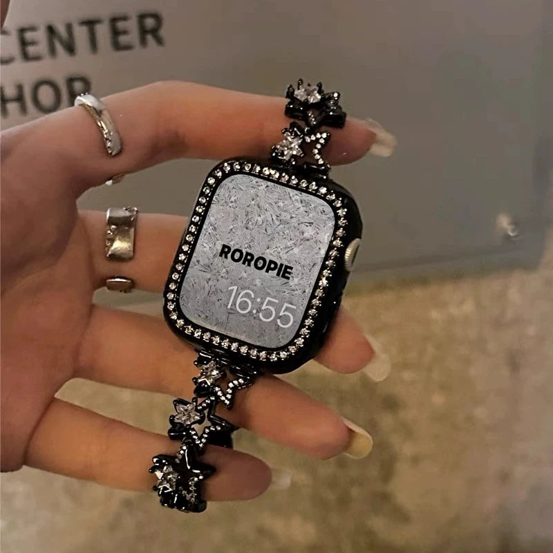 Luxury Diamond Apple Watch Band for Women – Star Metal Bracelet displayed on a hand with star-shaped design and rhinestones.