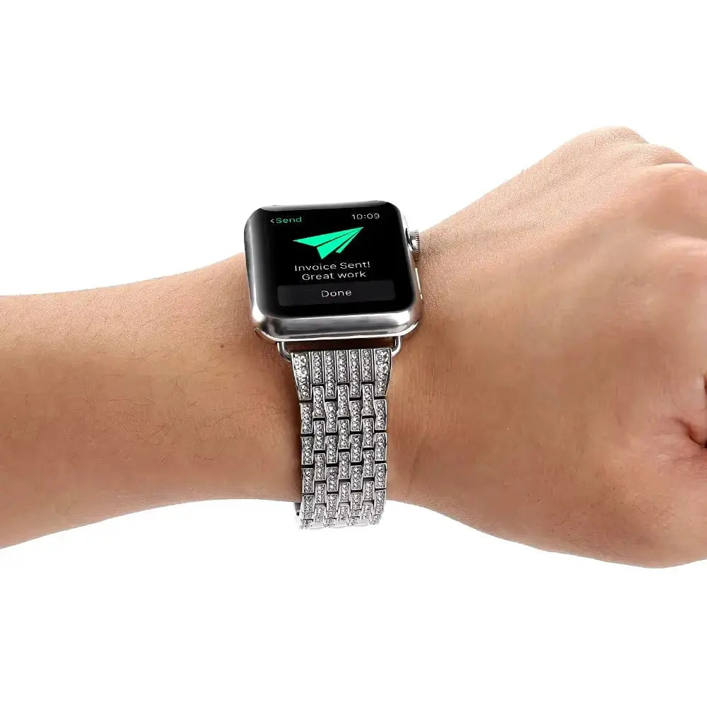 Luxury jewelry bracelet with CZ stones on wrist, compatible with Apple Watch Ultra and Series models.