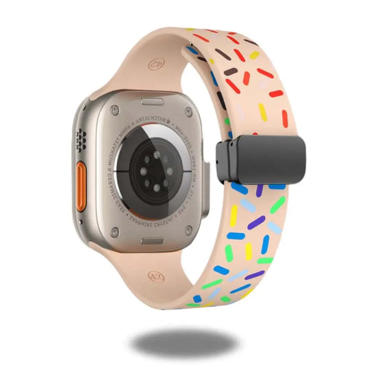 Rainbow silicone magnetic clasp band for Apple Watch, featuring a joyful design and no clasp closure for comfort.