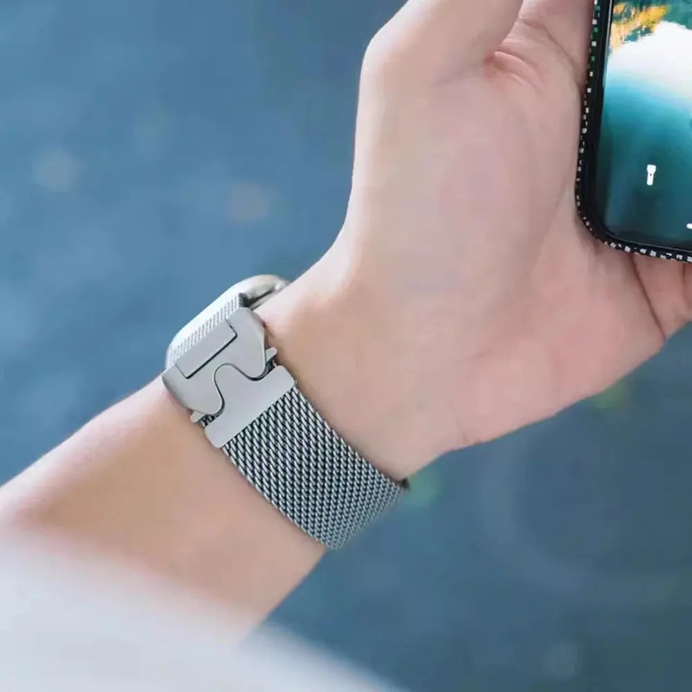Close-up of a premium Metal Mesh Loop for Apple Watch, showcasing its parachute-style buckle and lightweight design.