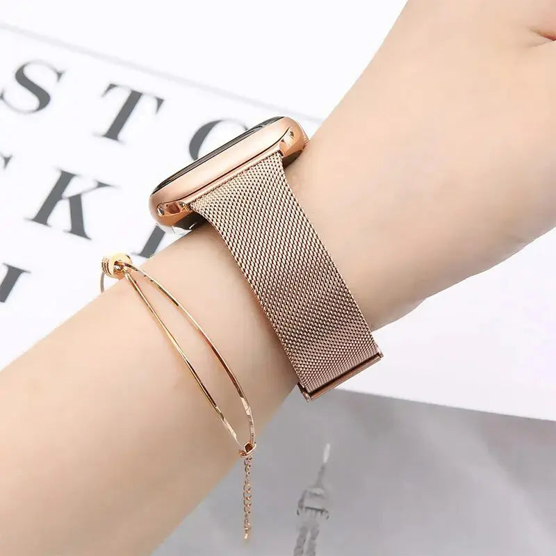 Slim Milanese Loop in rose gold on wrist, featuring premium stainless steel adjustable clasp for iWatch.