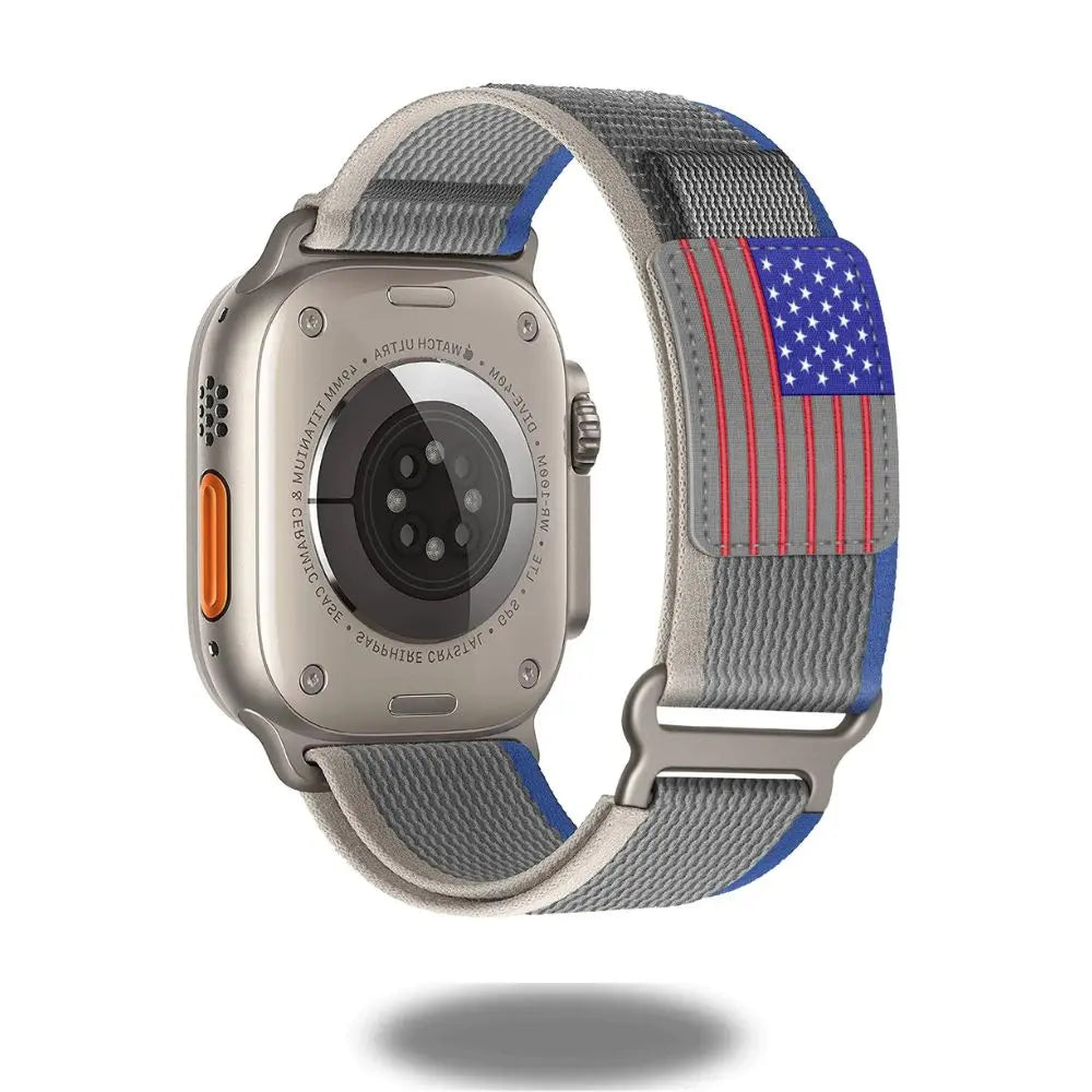 Stylish Travel Loop for Apple Watch featuring American flag design, adjustable stainless steel loop for a rugged fit.