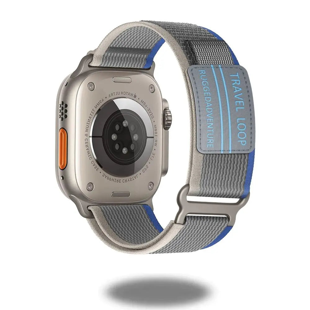 Travel Loop for Apple Watch featuring a stylish gray and blue band with adjustable stainless steel loop for adventure.