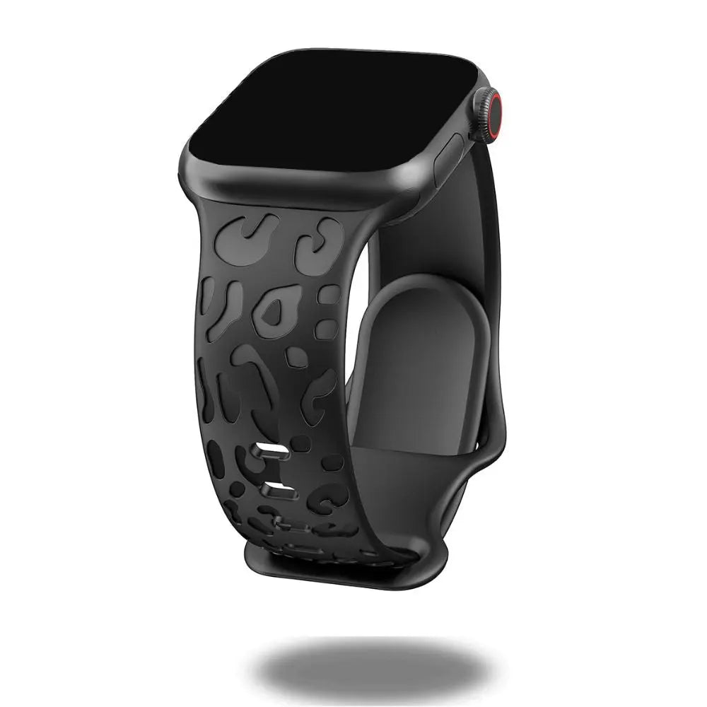 Engraved leopard's paws silicon band for Apple Watch, stylish and comfortable wrist accessory.