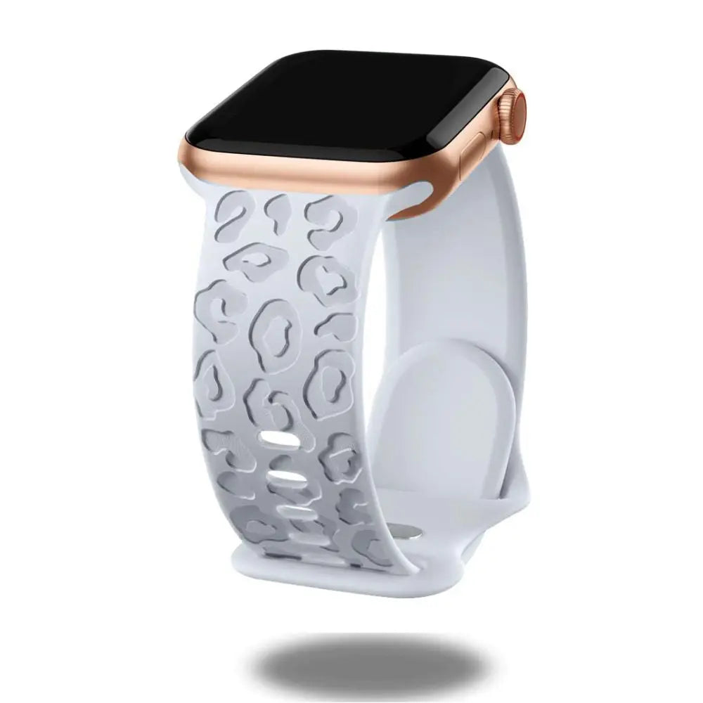Engraved leopard's paws silicon band for Apple Watch showcasing elegant design and comfort.