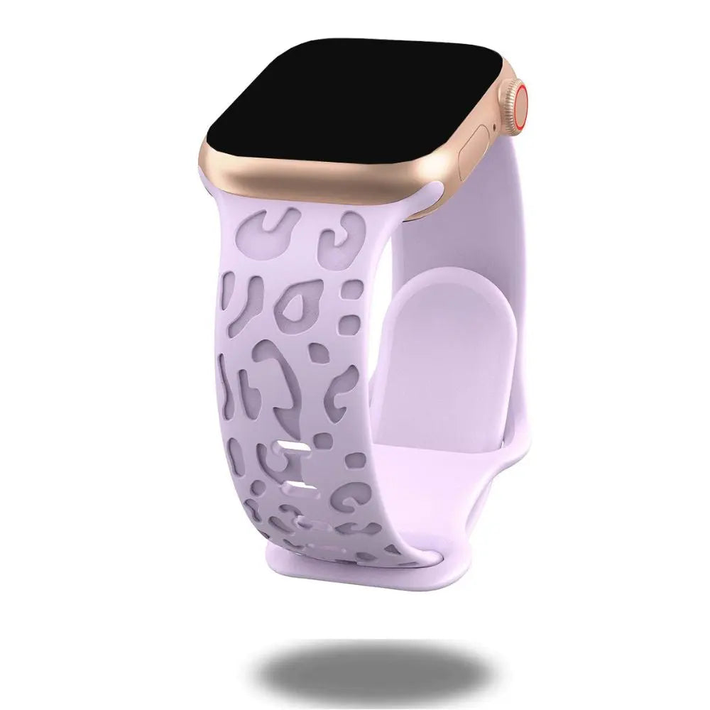 Engraved leopard paws silicone band for Apple Watch, stylish and comfortable wrist accessory.