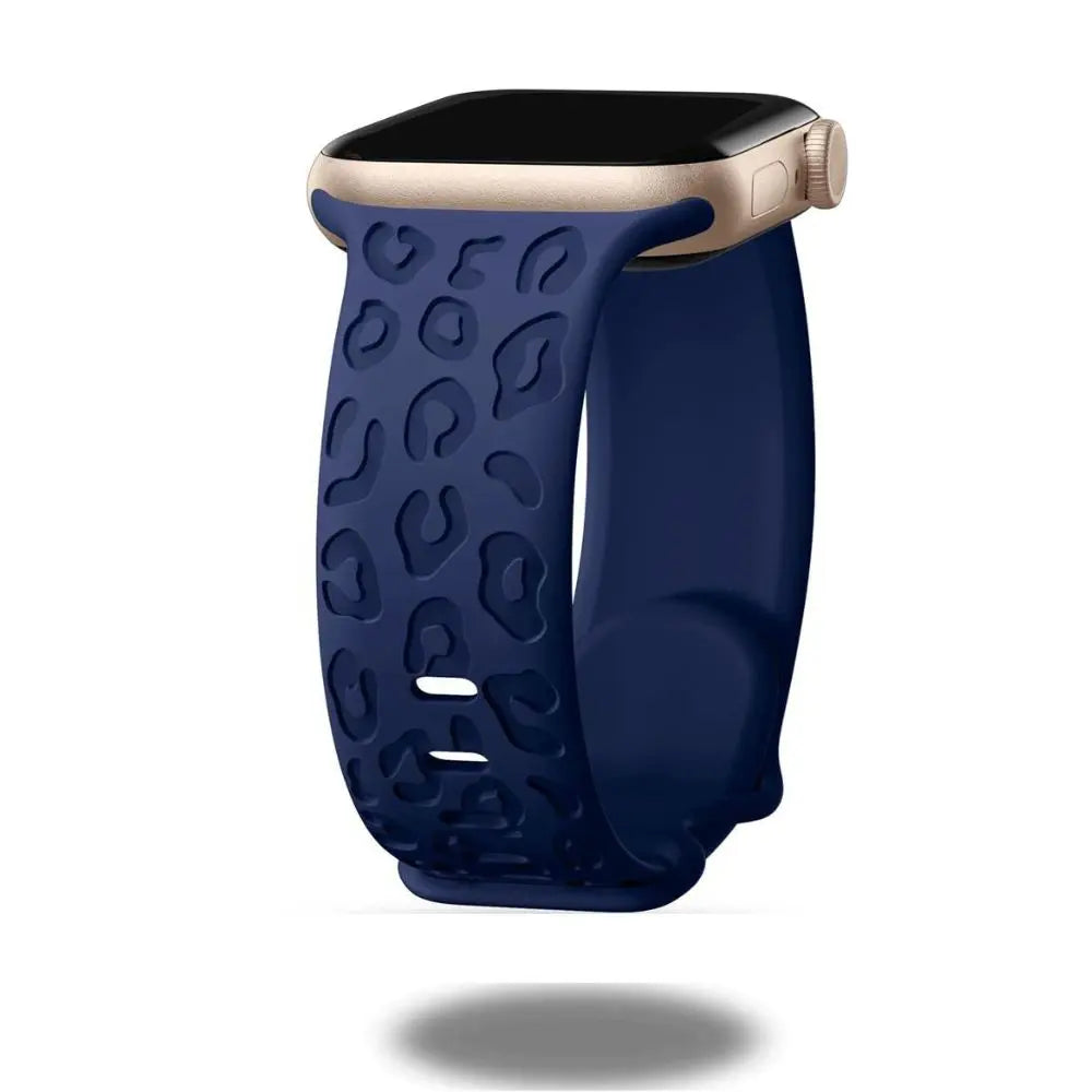 Engraved leopard's paws silicon band for Apple Watch, navy blue, stylish and comfortable wrist accessory.