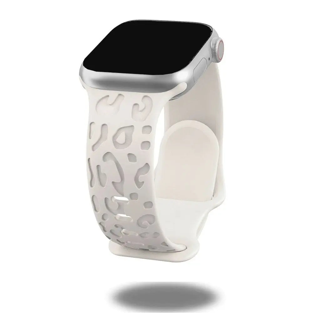 Engraved leopard's paws silicon band for Apple Watch, showcasing elegant design and comfort.