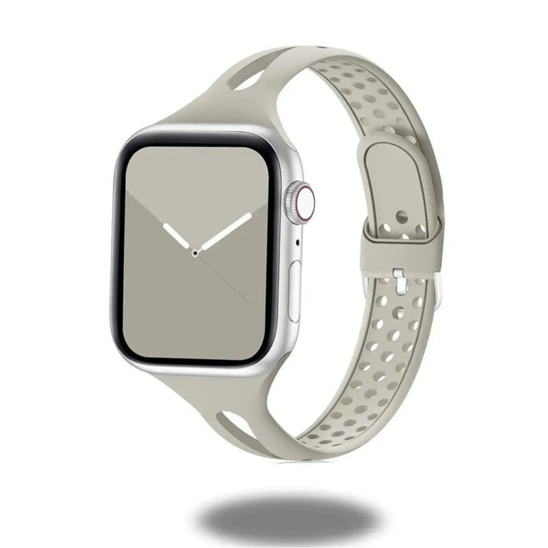 Slim silicone breathable band for Apple Watch in light color, showcasing sporty elegance and comfort.