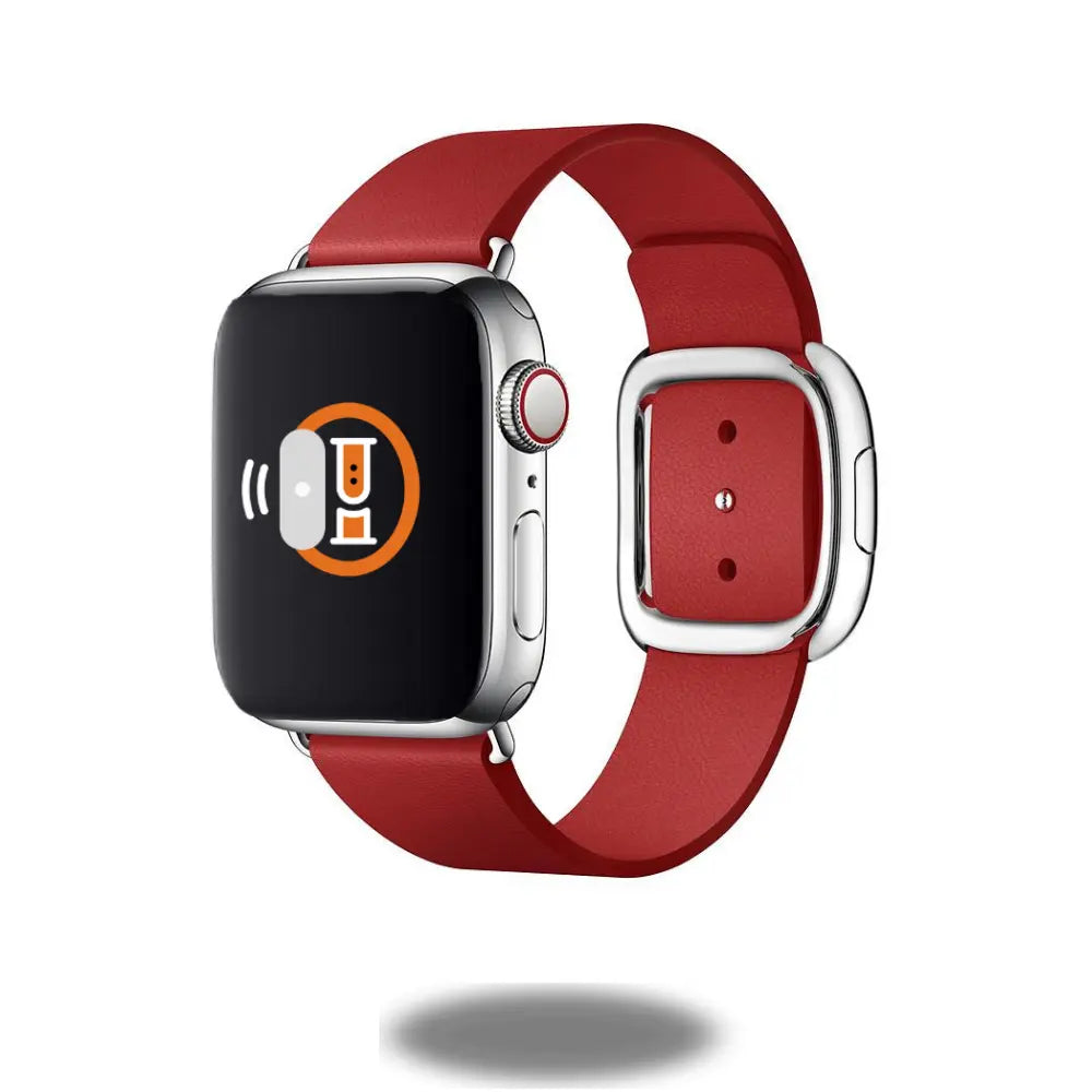 Modern buckle band for Apple Watch in bright red, made of smooth leather with magnetic closure and unibody design.