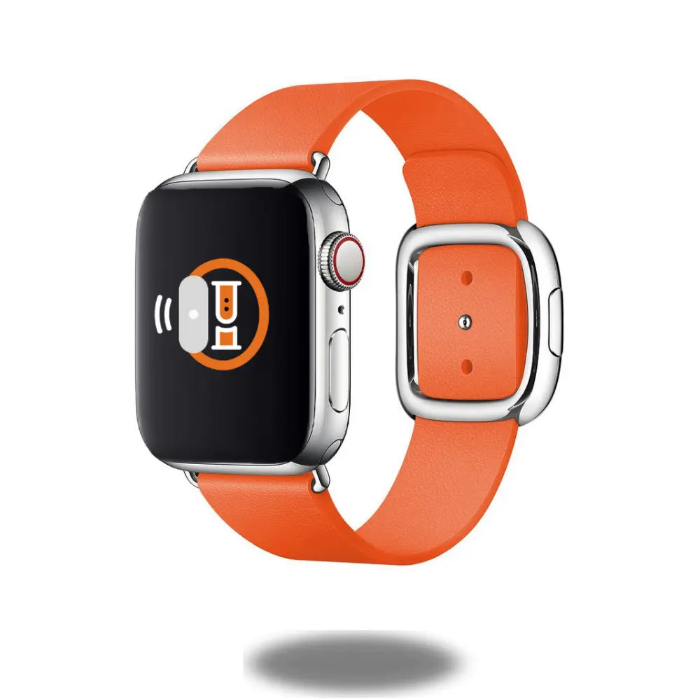 Modern buckle band in orange leather for Apple Watch, featuring a smooth texture and magnetic closure for secure fit.