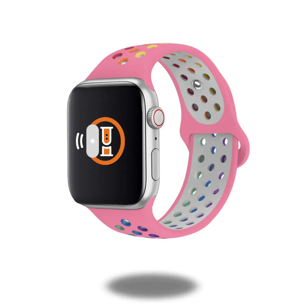 Pink silicone sport band for Apple Watch with breathable holes, perfect for workouts and daily style.