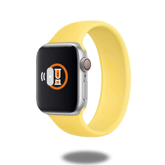 Silicon Solo Loop Band in yellow on Apple Watch, showcasing elasticity and comfort for active lifestyles.